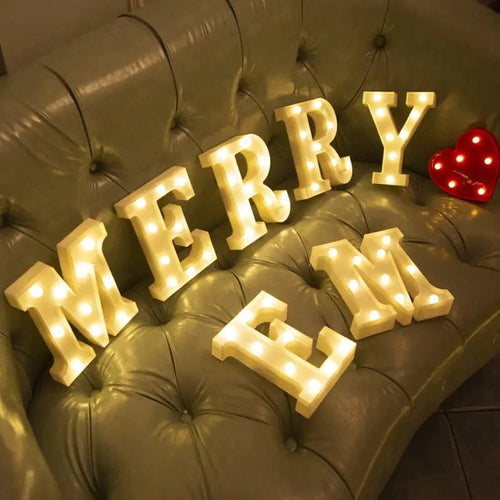 Mandotos luminous letter lights spelling out a word, glowing softly with warm LED illumination for decorative use.