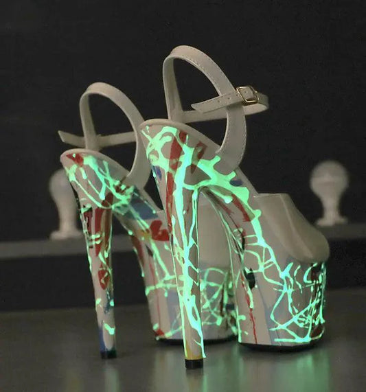 Mandotos lustrous leather stilettos with pointed toes and high heels, showcasing a sleek and elegant design.