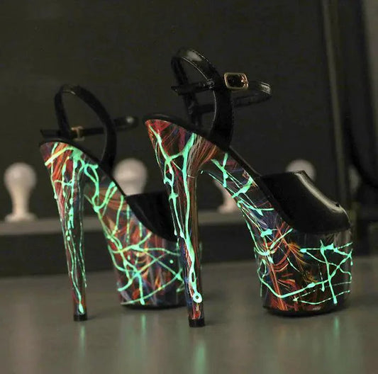 Mandotos lustrous leather stilettos featuring sleek pointed toes and high heels, stylish footwear for elegant occasions.