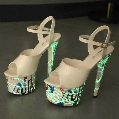Mandotos lustrous leather stilettos with pointed toes and sleek heel, stylish footwear for elegant occasions.