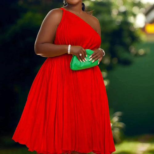Mandotos Luxe Couture ruffle midi dress with flowing pleats, showcasing elegant design and feminine style.