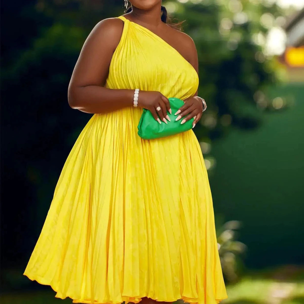 Mandotos Luxe Couture ruffle midi dress with flowing pleats, elegant design, and stylish silhouette for sophisticated occasions.