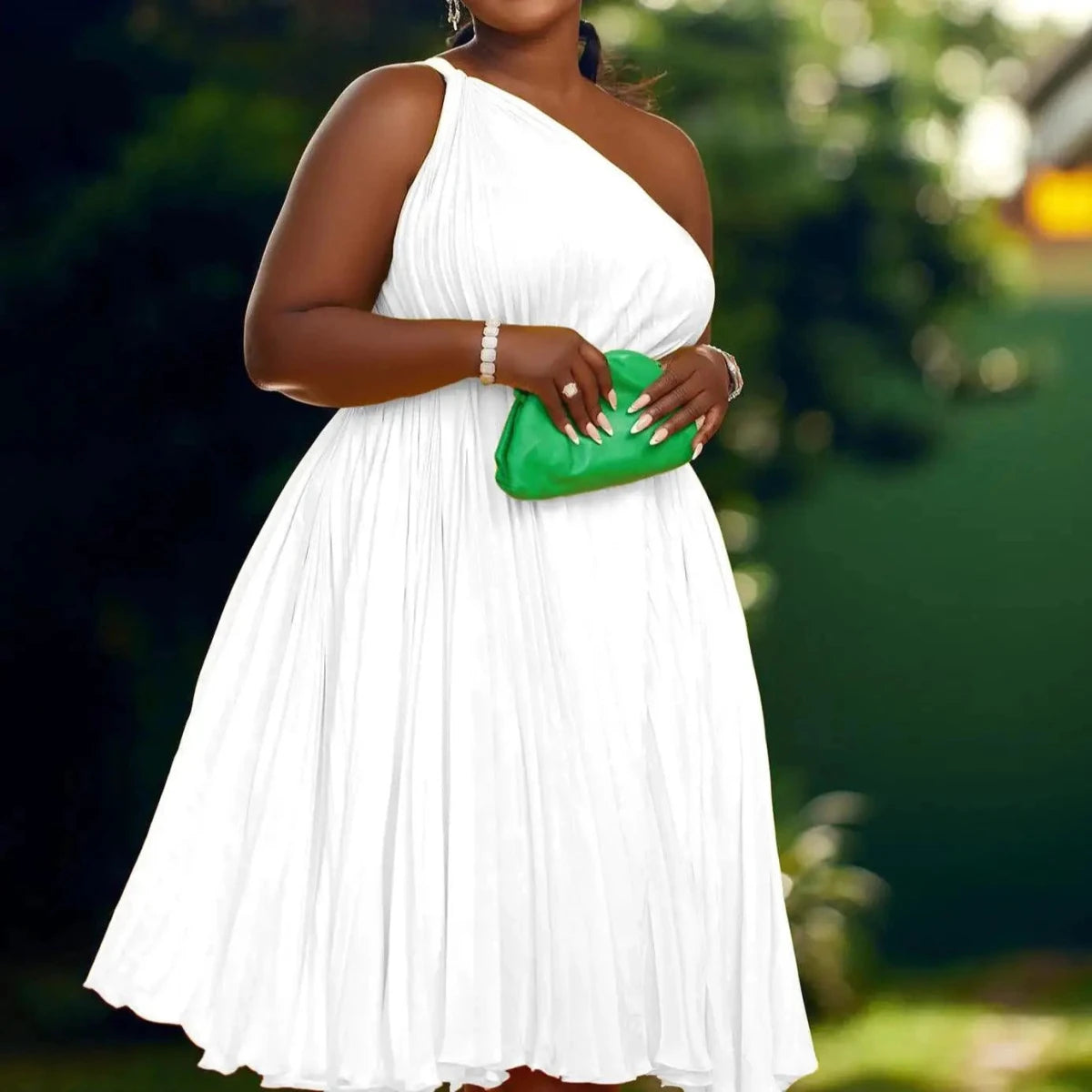 Mandotos Luxe Couture ruffle midi dress with flowing pleats, showcasing elegant fabric and stylish design for sophisticated occasions.