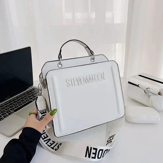 Luxurious women's shoulder purse by MANDOTOS featuring elegant design and spacious interior, perfect for stylish everyday use.