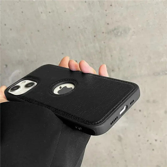 Luxurious MANDOTOS leather sleeve showcasing smooth, high-quality leather with sleek stitching and a refined finish.