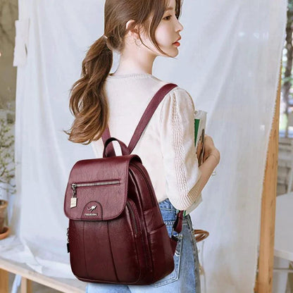 Luxury embossed leather backpack by MANDOTOS showing textured leather and stylish design with adjustable straps.
