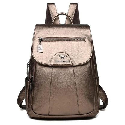 Luxury embossed leather backpack by MANDOTOS with sleek design and textured finish, featuring adjustable straps and top handle.