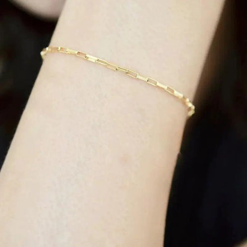 Handcrafted luxury gold chain bracelet by MANDOTOS, featuring intricate links and a polished finish.