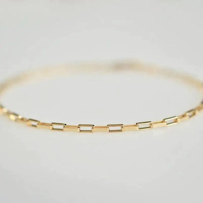 Handcrafted luxury gold chain bracelet by MANDOTOS featuring intricate links and a polished finish.