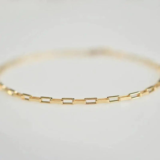 Handcrafted luxury gold chain bracelet by MANDOTOS featuring intricate links and a polished finish.