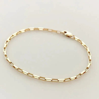 Handcrafted luxury gold chain bracelet by MANDOTOS featuring intricate links and a polished finish.