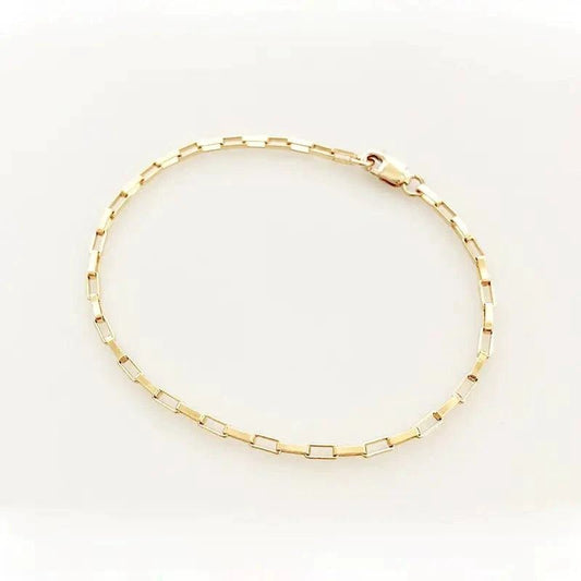 Handcrafted luxury gold chain bracelet by MANDOTOS, featuring intricate links and a polished finish.