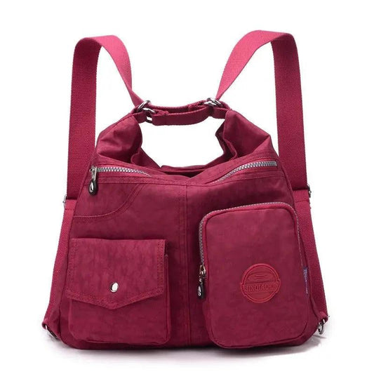 Mandotos luxury waterproof Bylon cloth crossbody handbag for women with large capacity, shoulder strap, and tote-style design.