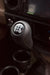 Luxury leather gear shift kit by MANDOTOS featuring a sleek, high-quality leather cover for car gear shifter.