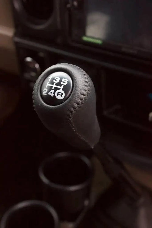 Luxury leather gear shift kit by MANDOTOS featuring a sleek, high-quality leather cover for car gear shifter.