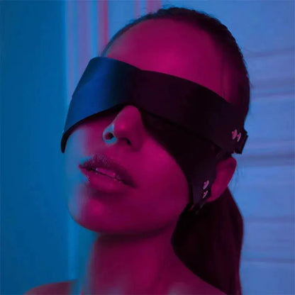 Luxury leather sleep mask by MANDOTOS featuring soft, premium leather with an adjustable strap for comfortable nighttime rest.
