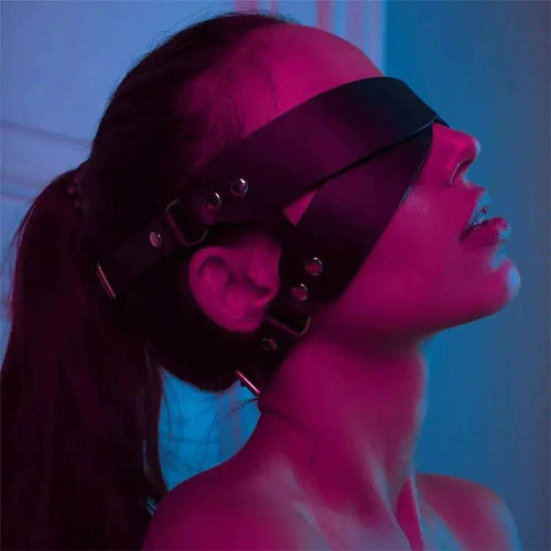 Luxury leather sleep mask by MANDOTOS with soft, padded design and adjustable strap for comfortable, restful sleep.