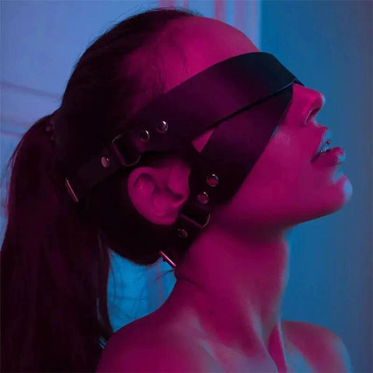 Luxury leather sleep mask by MANDOTOS with soft, padded design and adjustable strap for comfortable, restful sleep.