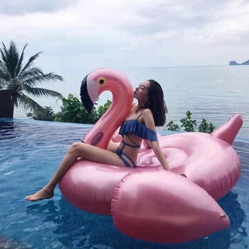 Majestos Flamingo and Unicorn pool floats by MANDOTOS, featuring vibrant pink flamingo and colorful unicorn designs.