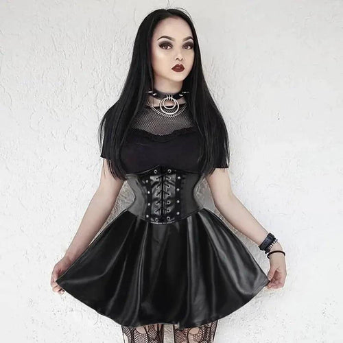 Mandotos black leather lace-up skirt with front lacing detail, form-fitting design, and sleek finish, perfect for stylish outfits.