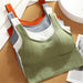 Mandotos breathable women's sports bra and seamless yoga top, shockproof, push-up design for gym and workout activities.