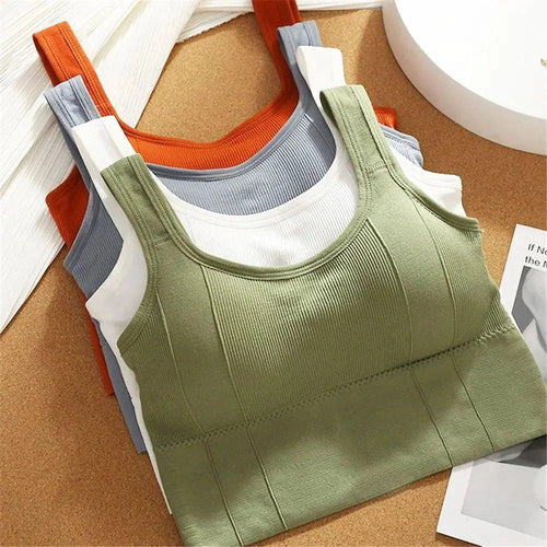 Mandotos breathable women's sports bra and seamless yoga top, shockproof, push-up design for gym and workout activities.