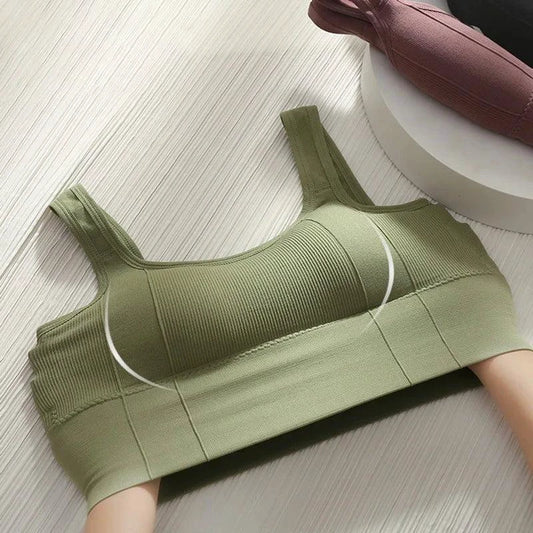 Mandotos breathable women's sports bra and seamless yoga crop top, shockproof, push-up design for gym and workout activities.