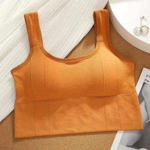 Mandotos breathable women's sports bra with seamless design, shockproof crop top, push-up support, ideal for yoga and gym workouts.