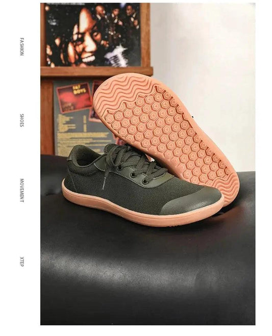 Mandotos men's breathable wide toe mesh running shoes with lightweight responsive sole for comfort and support during workouts.
