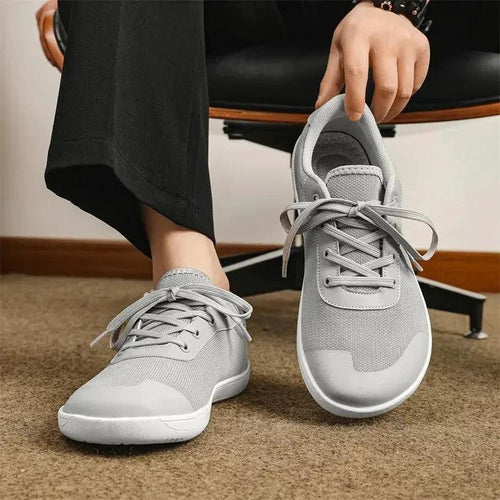 Mandotos men's breathable wide toe mesh running shoes with lightweight responsive sole for comfortable support.