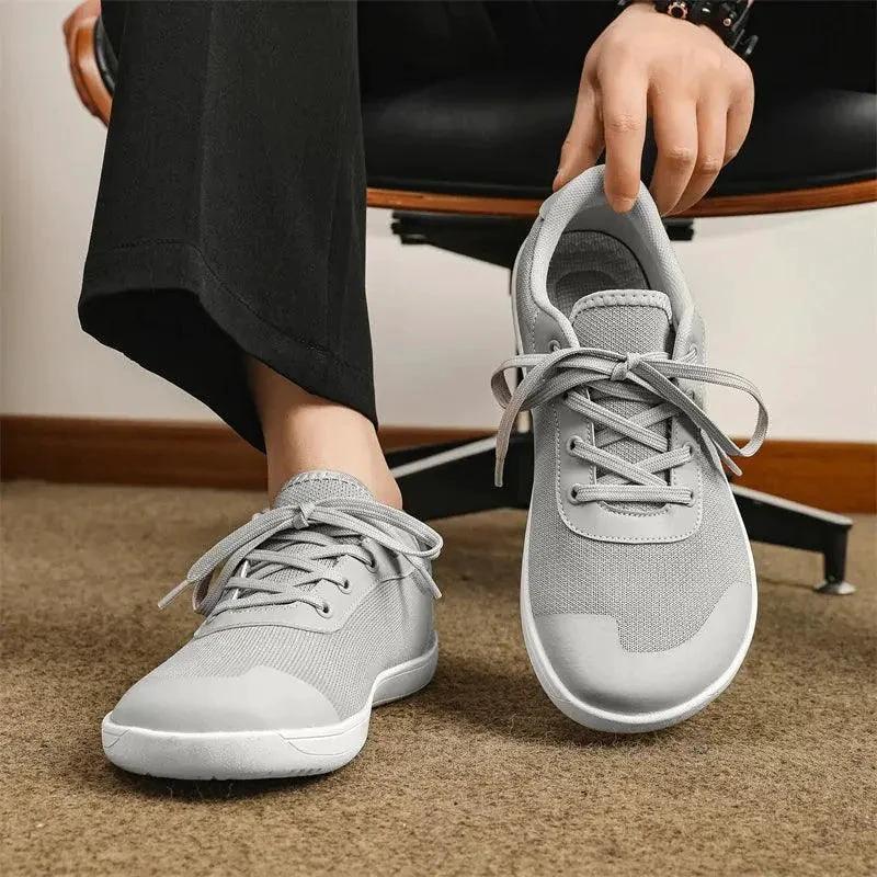 Mandotos men's breathable wide toe mesh running shoes with lightweight responsive sole for comfort and support during exercise