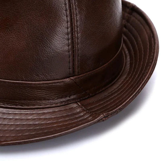 Mandotos brown leather cap made from premium cowhide in XL to XXXXL sizes, featuring a classic design and adjustable strap.