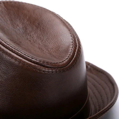Mandotos brown leather cap made from premium cowhide in XL to XXXXL size, featuring a classic design and sturdy construction.