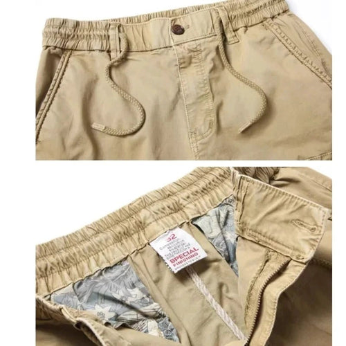 Mandotos men's gray cotton tactical cargo pants with full-length design, featuring multiple pockets and military-inspired style.