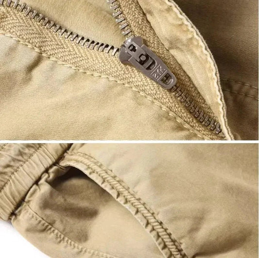 Mandotos men's gray cotton cargo pants with full-length tactical military design, featuring multiple pockets and durable fabric.