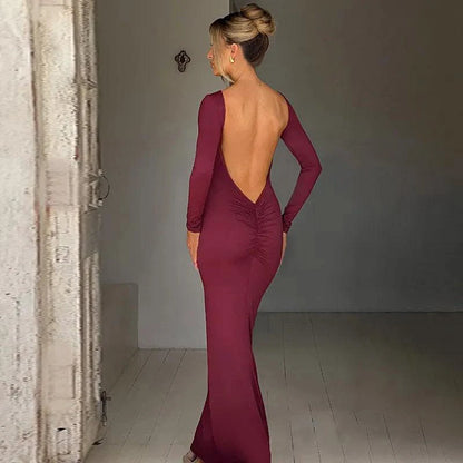 Mandotos Chic backless silk dress in milk silk with elegant design, showcasing a stylish backless silhouette and smooth fabric.
