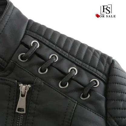 Mandotos chic black leather coat for women featuring zipper pockets and biker-style details, stylish and feminine outerwear.