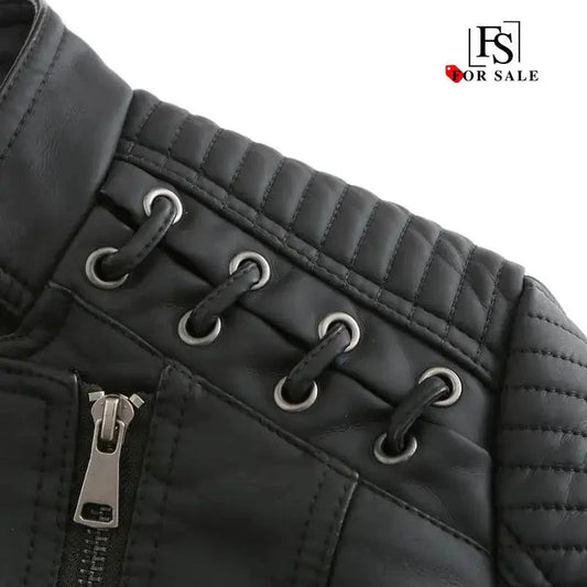 Mandotos chic black leather coat for women featuring zipper pockets and biker-style details, stylish and feminine outerwear.