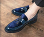 Mandotos men's blue leather loafers featuring a college-inspired design, handcrafted dress shoes with a sleek, polished finish.
