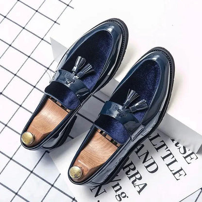 Blue Mandotos men's leather loafers featuring a college-inspired design, handcrafted dress shoes with a polished finish.