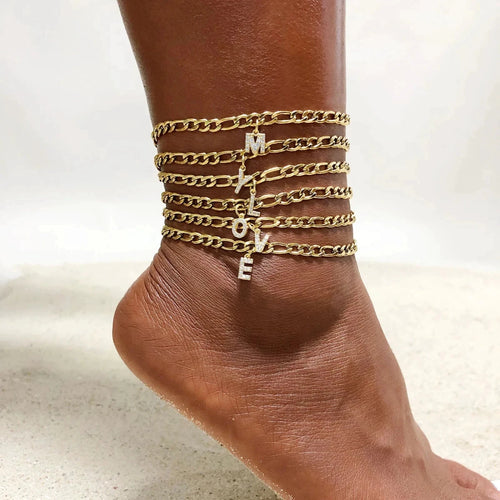 Mandotos crystal A-Z letter initial anklet for women with Cuban link stainless steel design, perfect for beachwear.