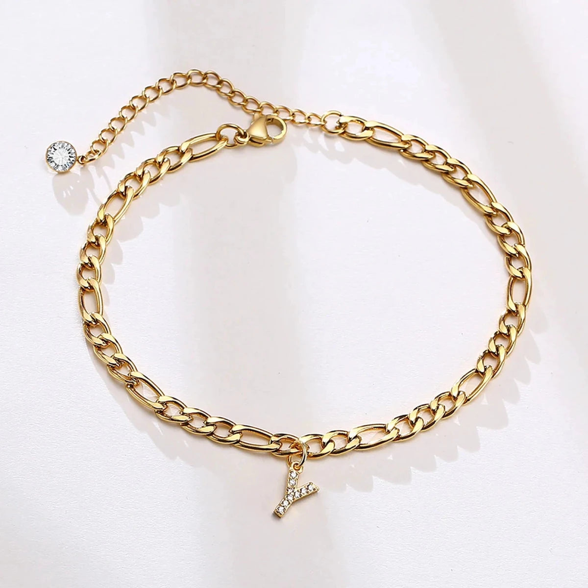 Mandotos crystal A-Z letter initial anklet for women with Cuban link stainless steel design, beach-ready accessory.