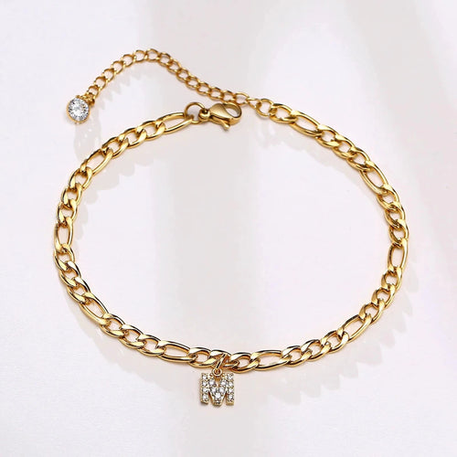 Mandotos crystal A-Z letter initial anklet for women with Cuban link stainless steel design and beach-ready style.