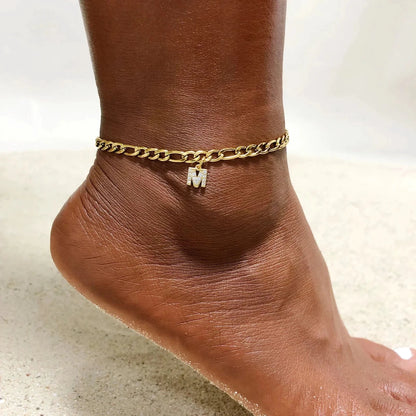 Mandotos crystal A-Z letter initial anklet for women with Cuban link stainless steel chain, beach-ready design.