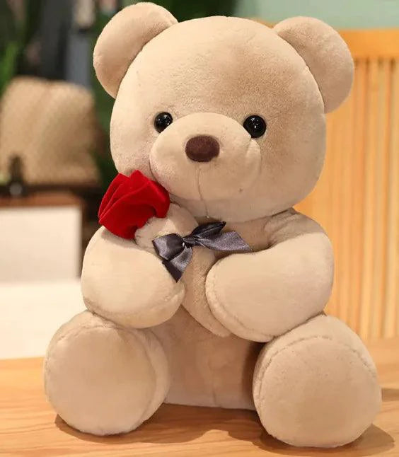 Mandotos Cuddly Rose Teddy Pillow with red rose detail and plush bear, available in 25, 35, and 45 cm sizes.