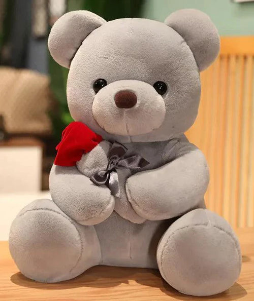 Mandotos Cuddly Rose Teddy Pillow with red rose detail and plush bear, available in 25, 35, and 45 cm sizes.