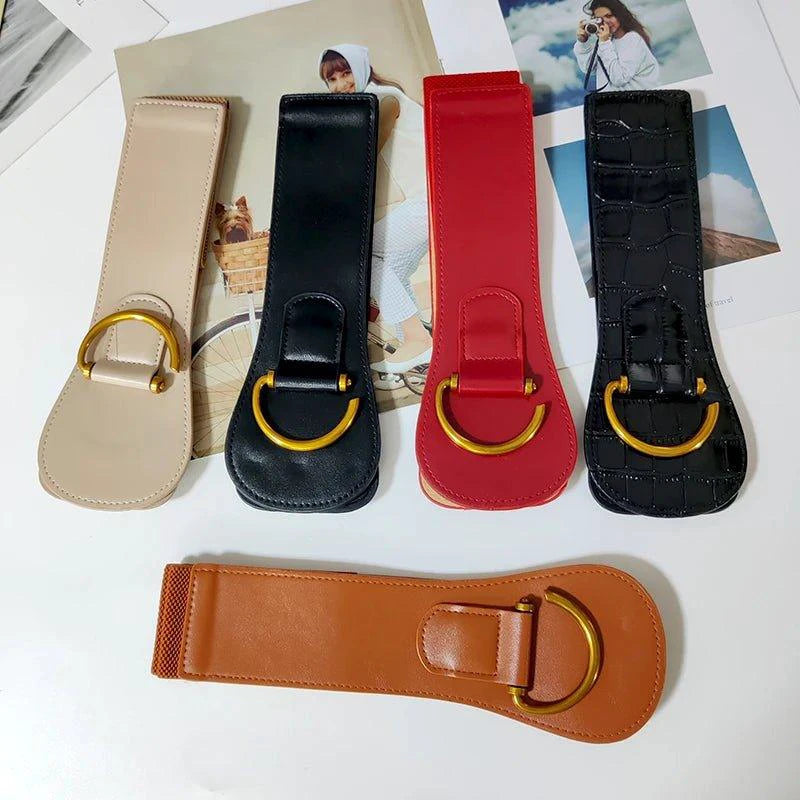 Mandotos designer women's burgundy leather waist cummerbund belt with wide stretch fit and gold buckle detail.