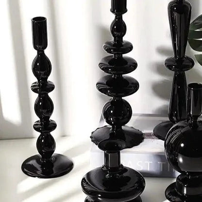 Mandotos Elegant Rue glass candlestick holder in black glass, ideal as a table centerpiece or gift idea.