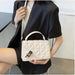 Black MANDOTOS rhombus pattern PU leather shoulder bag with zipper closure, compact messenger style, measuring 22x14x7 cm.