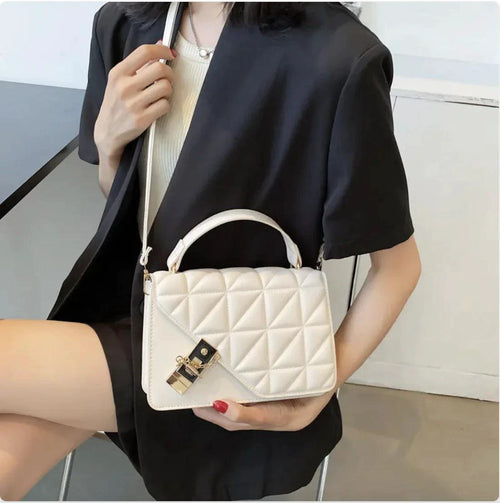 Black MANDOTOS rhombus pattern PU leather shoulder bag with zipper closure, compact messenger style, measuring 22x14x7 cm.